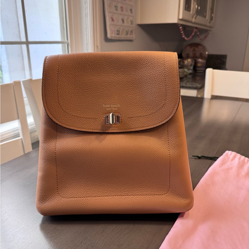 Kate Spade backpack. With dust bag  Excellent condition. brown tan/taupe